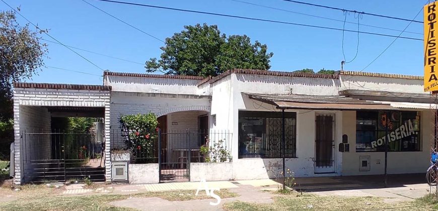 Casa con local comercial