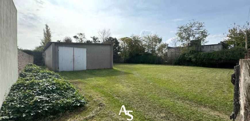 Terreno de 858m2 con galpón