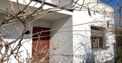 Gran terreno con casa de 135 m2