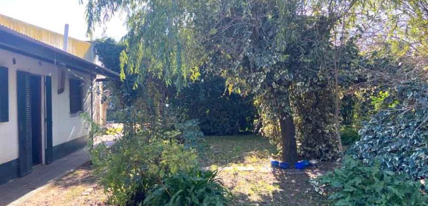 Gran terreno con casa de 135 m2