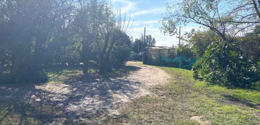 Gran terreno con casa de 135 m2