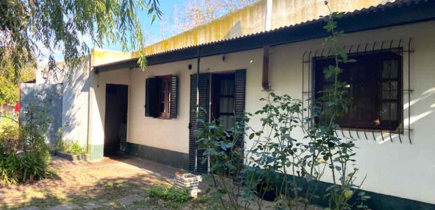 Gran terreno con casa de 135 m2