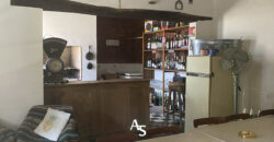 Casa antigua + local comercial