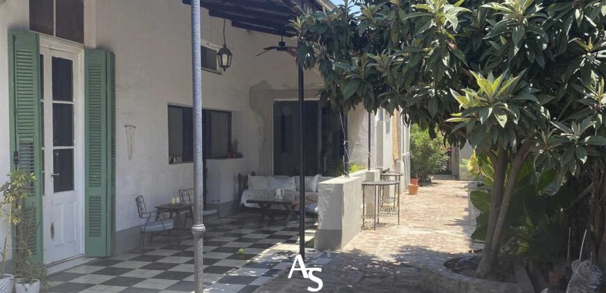 Casa antigua + local comercial